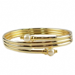 Gold spiral upper arm bracelet with small pearls 