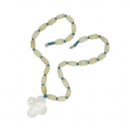 Beige bead necklace with white shell cross