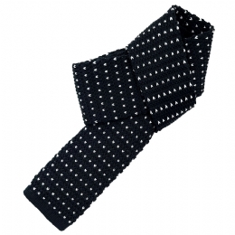 Black very narrow knitted tie with white dots