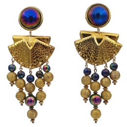 Long gold clip earrings with blue iridescent beads and gold charms