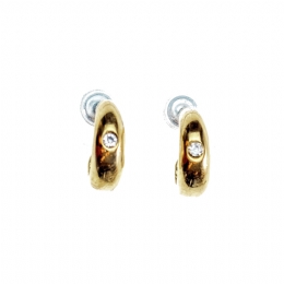 Small golden hoop earrings with white strass