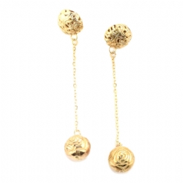 Long gold carved earrings