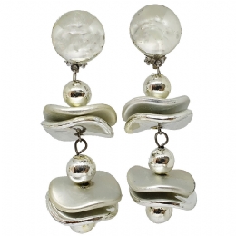 Long silver clip earrings with wavy parts and silver beads